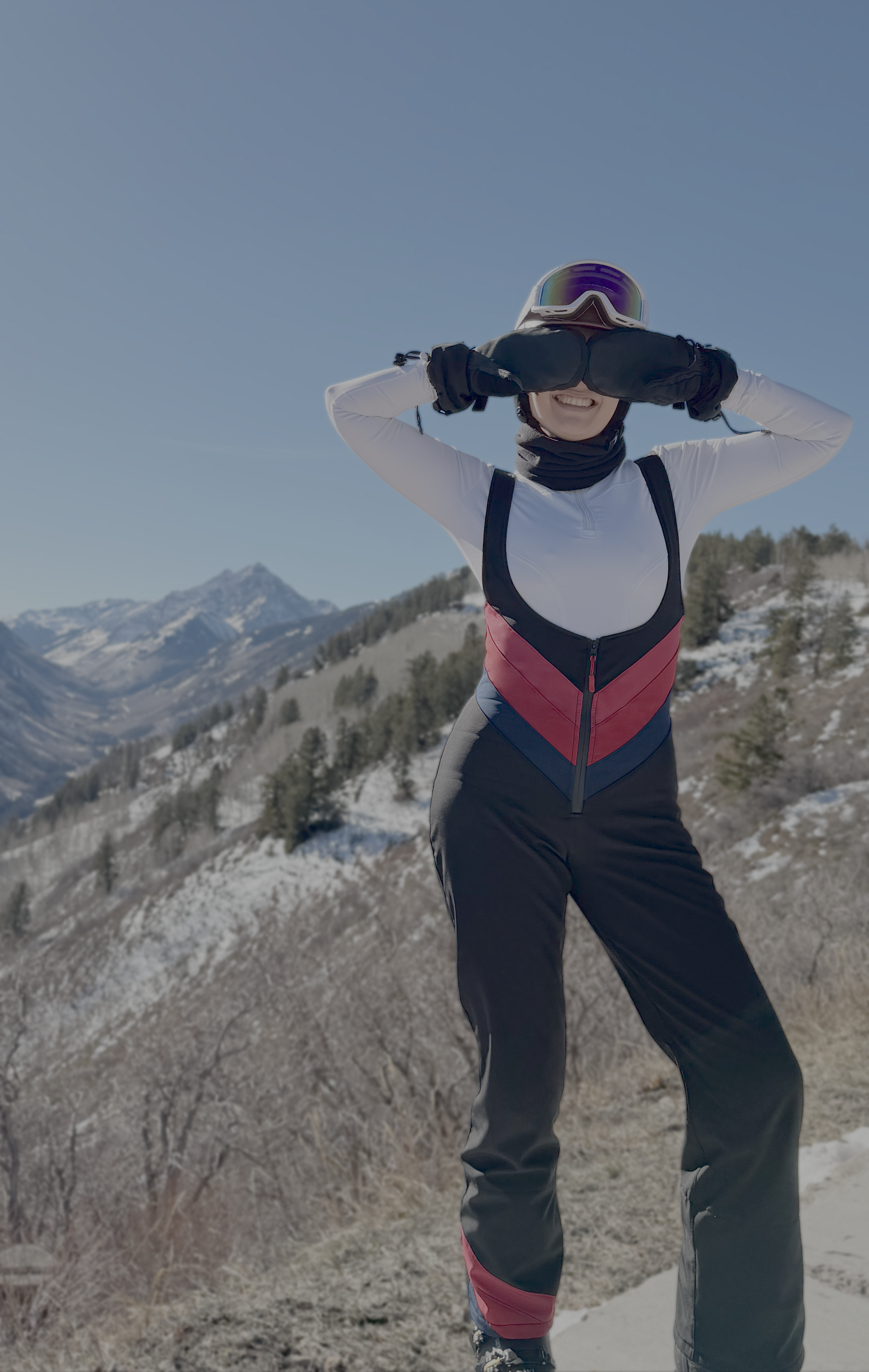 Model wearing the Buttermilk Ski Suit in black